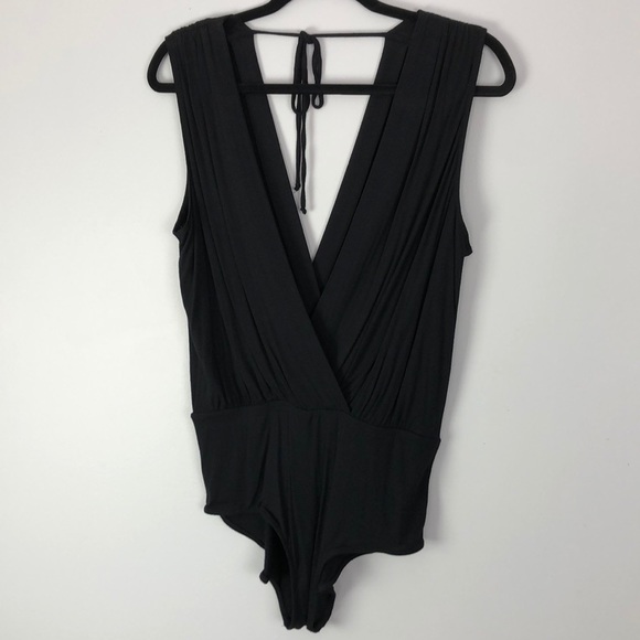 BCBGeneration Tops - NWT- BCBGeneration Black Low V-Neck Bodysuit